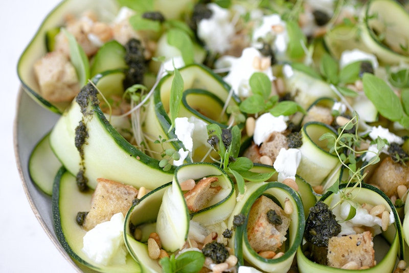 zucchini ribbons, croutons, goat cheese; healthy squash recipes concept