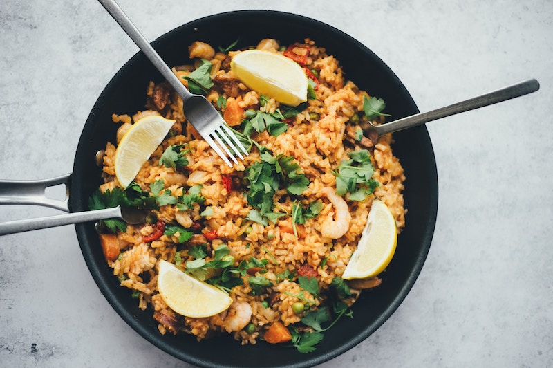 stir fry rice in pan with utensils; healthy stir fry recipes concept