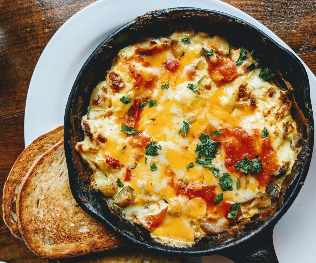 egg skillet with bread on side; healthy breakfast casserole recipes concept