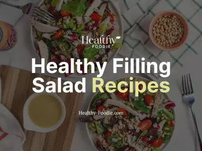 Healthy Foodie featured image with chicken salad bowls image overlaid with the words "Healthy Filling Salad Recipes"